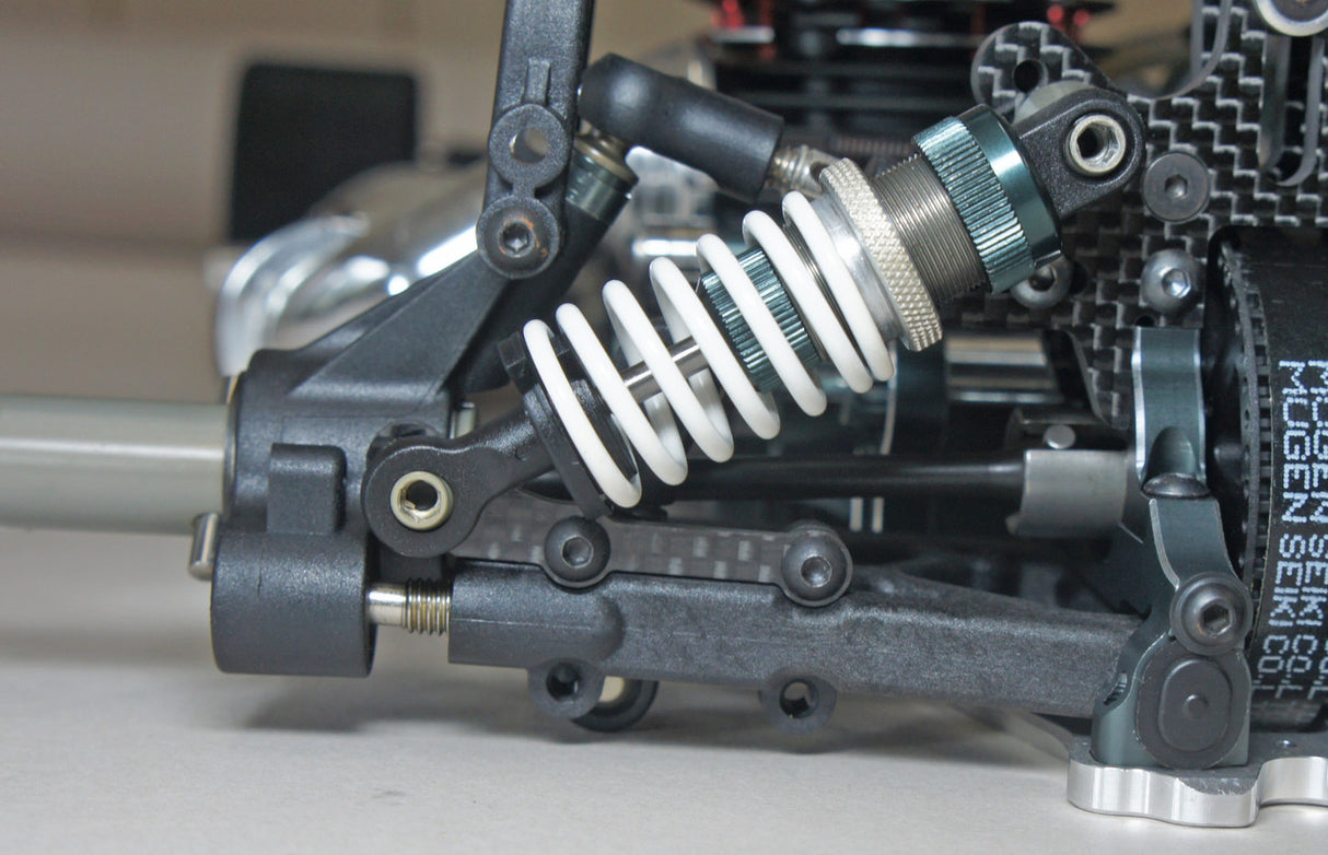 Mugen Carbon Rear Lower Shock Mount 3mm (1 pc): MRX6X/6 - Iron City RC Hobbies
